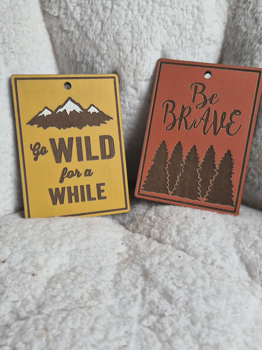 Go Wil and Be Nrave wooden signs